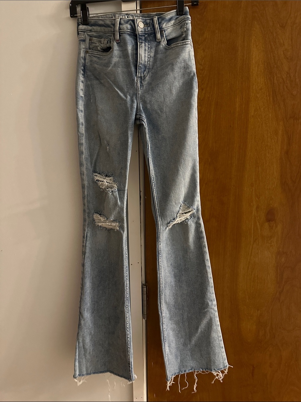 Women's Light Blue Distressed Flare Jeans
